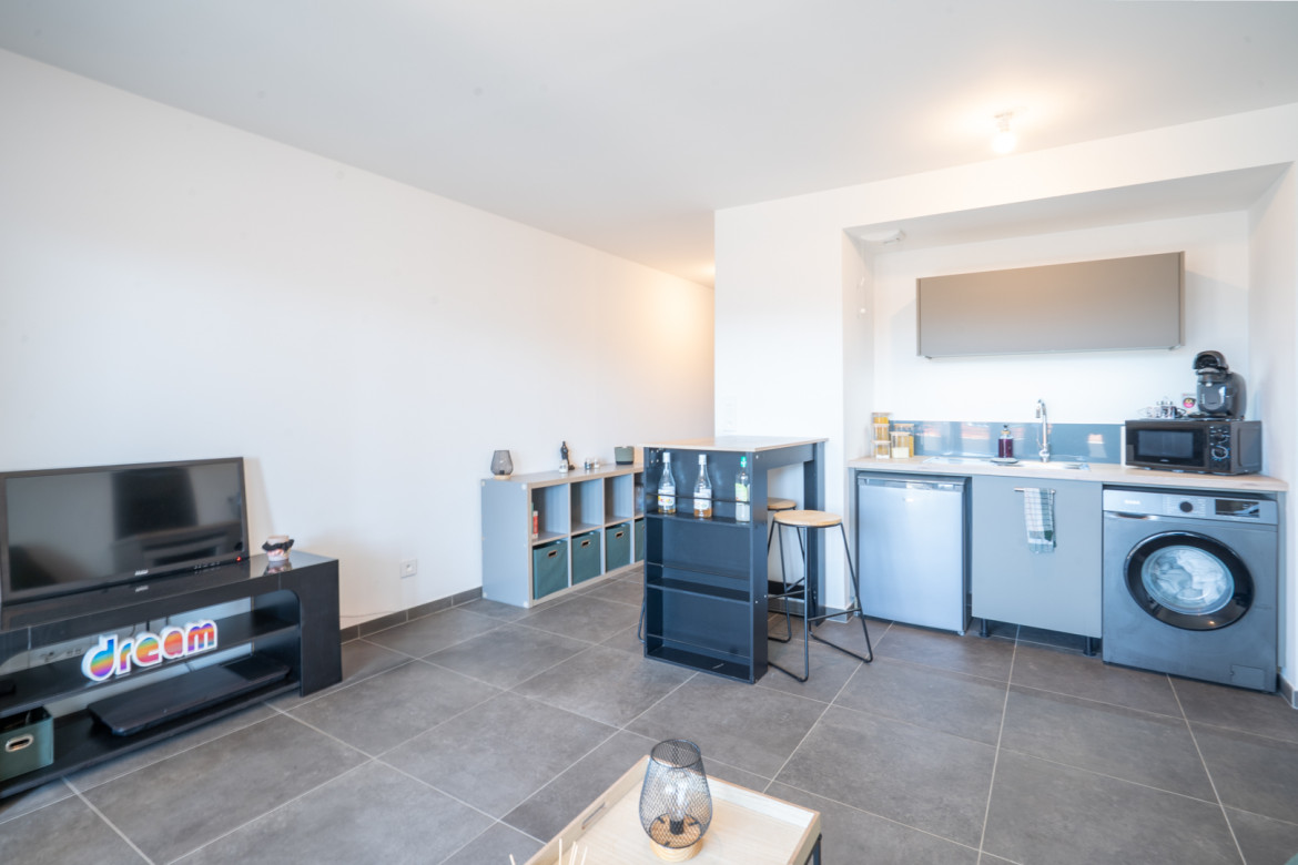 Studio loué, immeuble récent - Photo #1